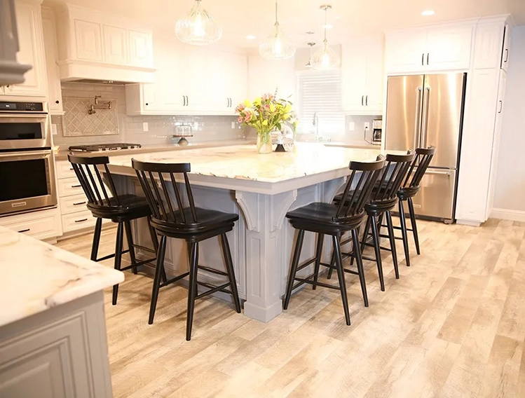 Light and airy kitchen with stylish luxury vinyl plank flooring