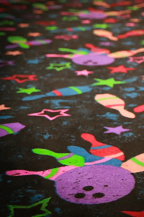 Closeup of bowling themed carpeting, Selma, CA