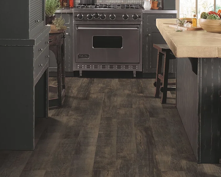Laminate flooring with rustic wood-look planks in country kitchen