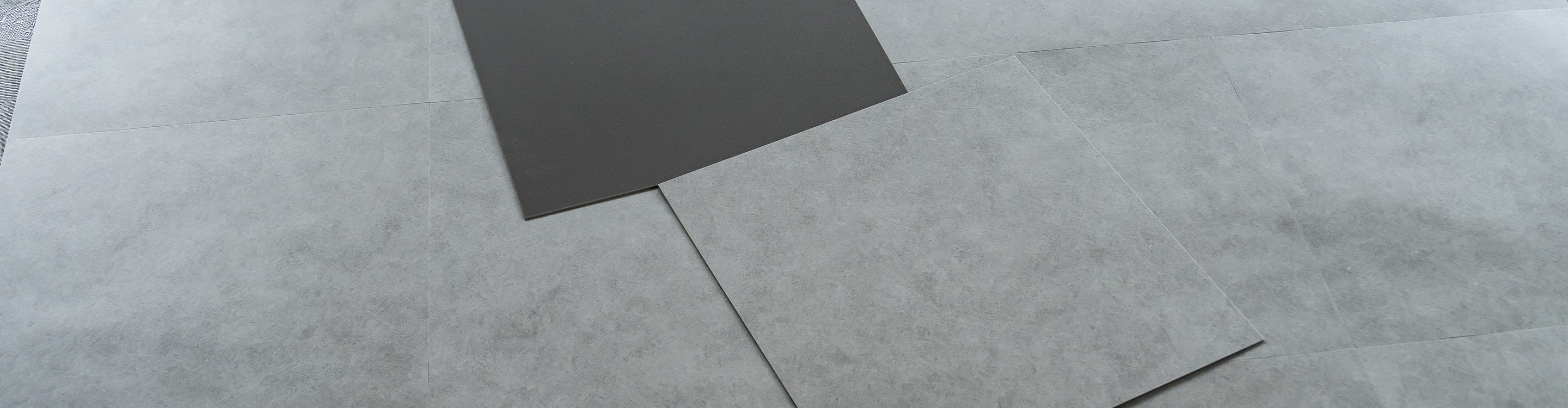 Closeup of gray luxury vinyl tile