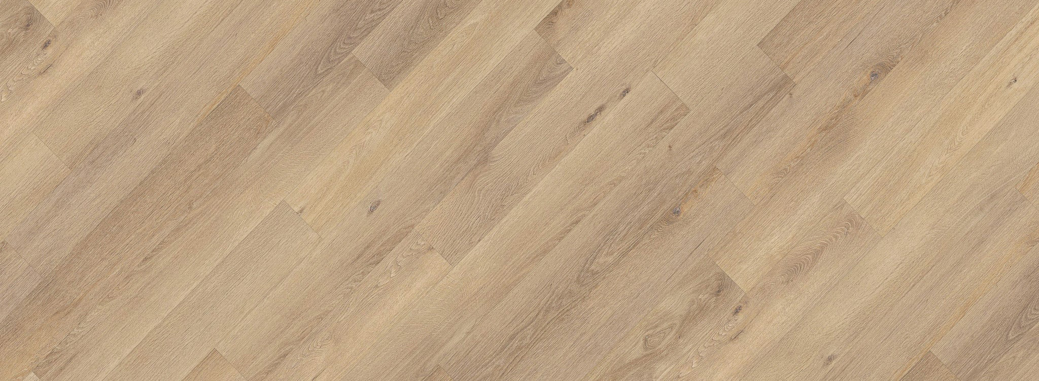 Sandy vinyl plank flooring, close-up view