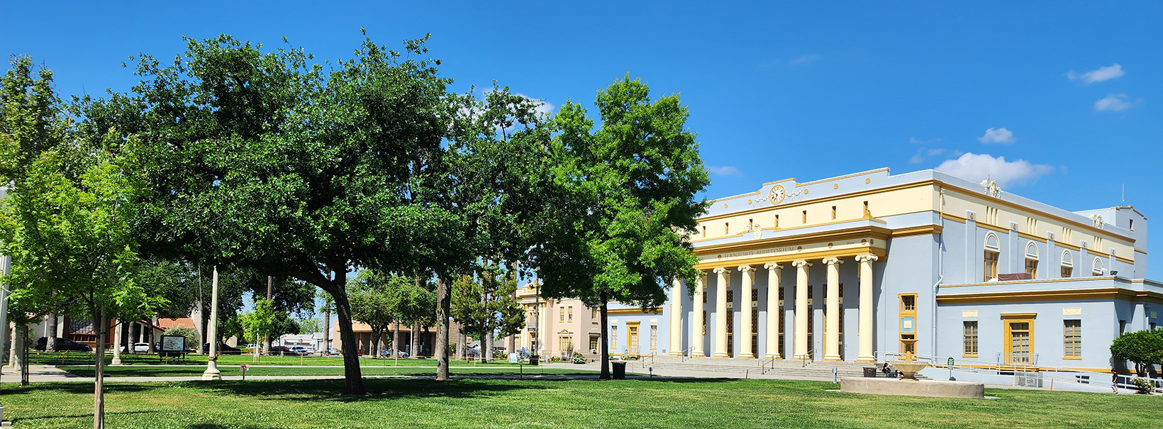 Community Building with Green Trees 
