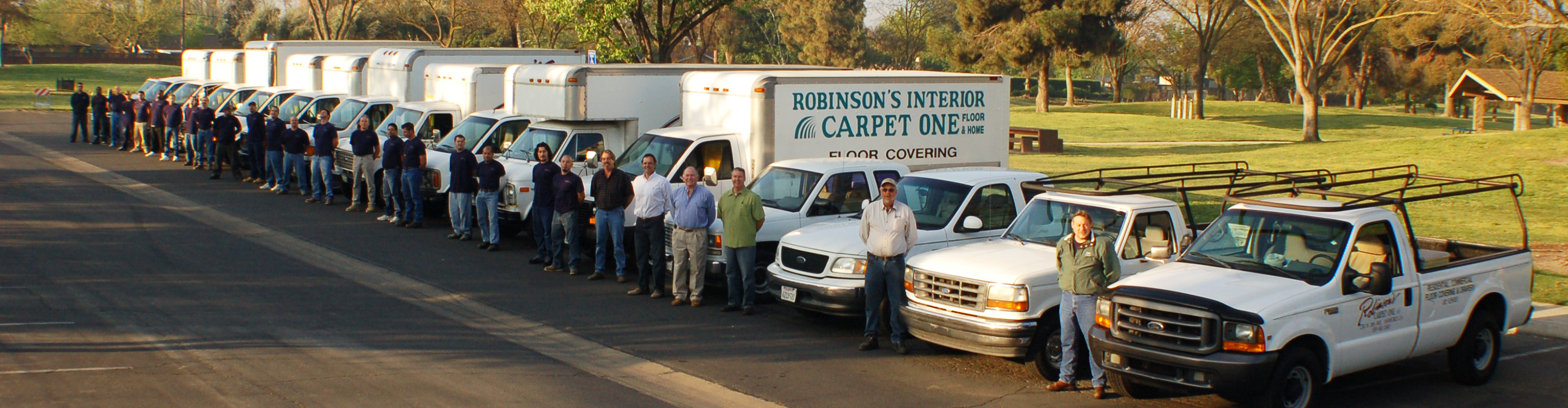 Robinson's Interior Fleet of Flooring Trucks With Crews Standing By