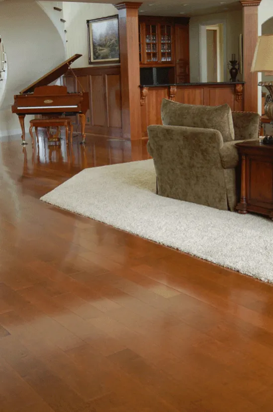Hardwood flooring transition to tuck and roll carpeting