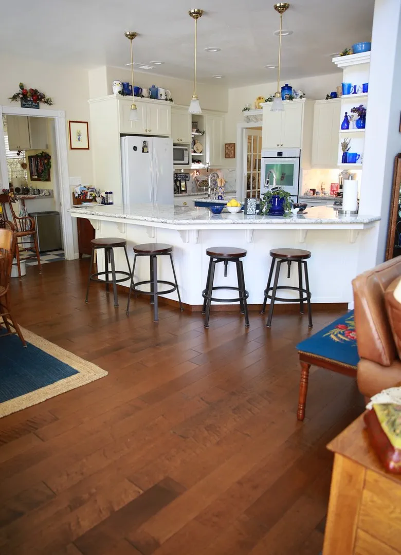 Kitchen bar area with engineered hardwood flooring in Lemoore, CA
