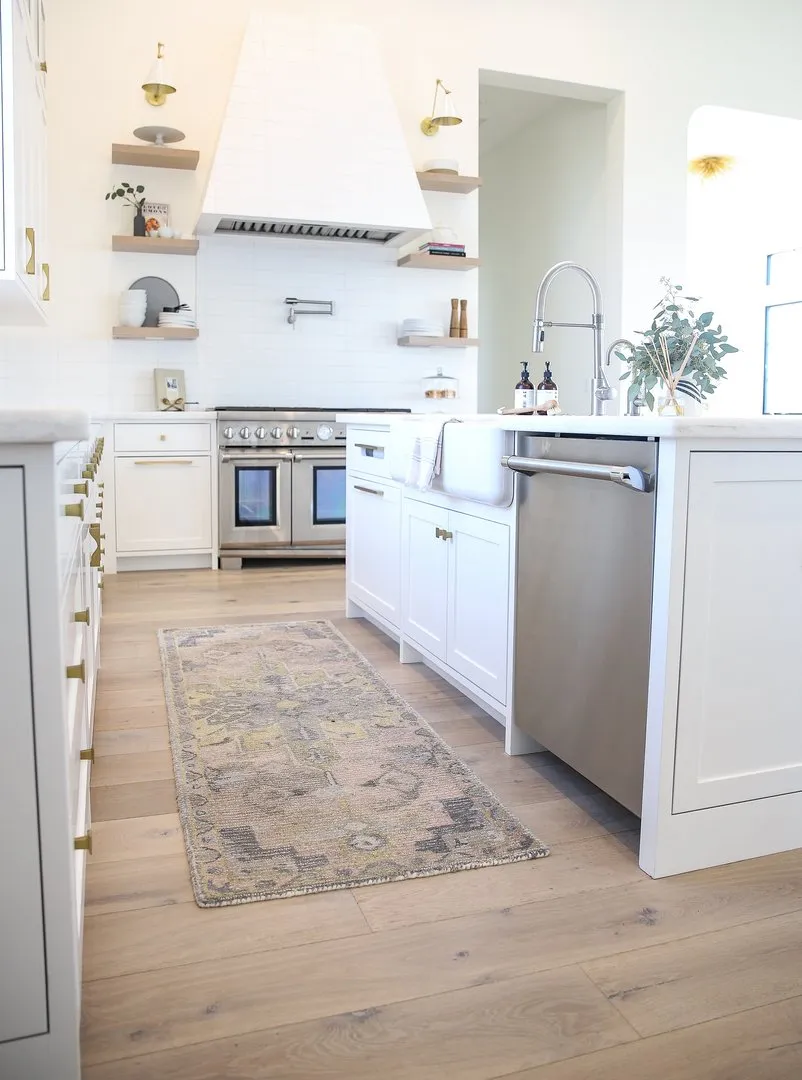 Kitchen with hardwood flooring and area rug, Hanford, California