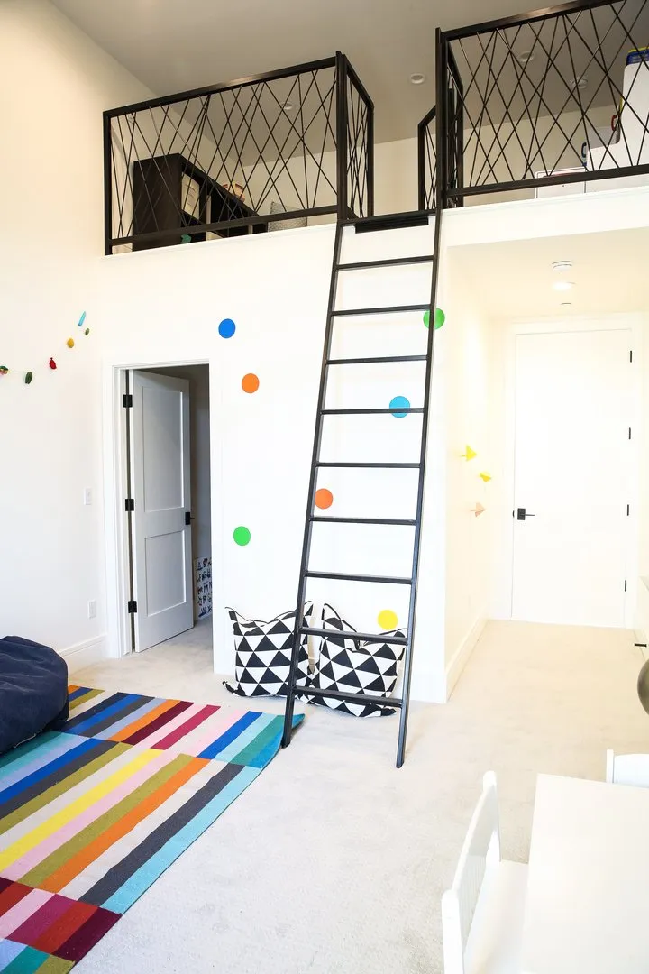 Whimsical loft area with carpet