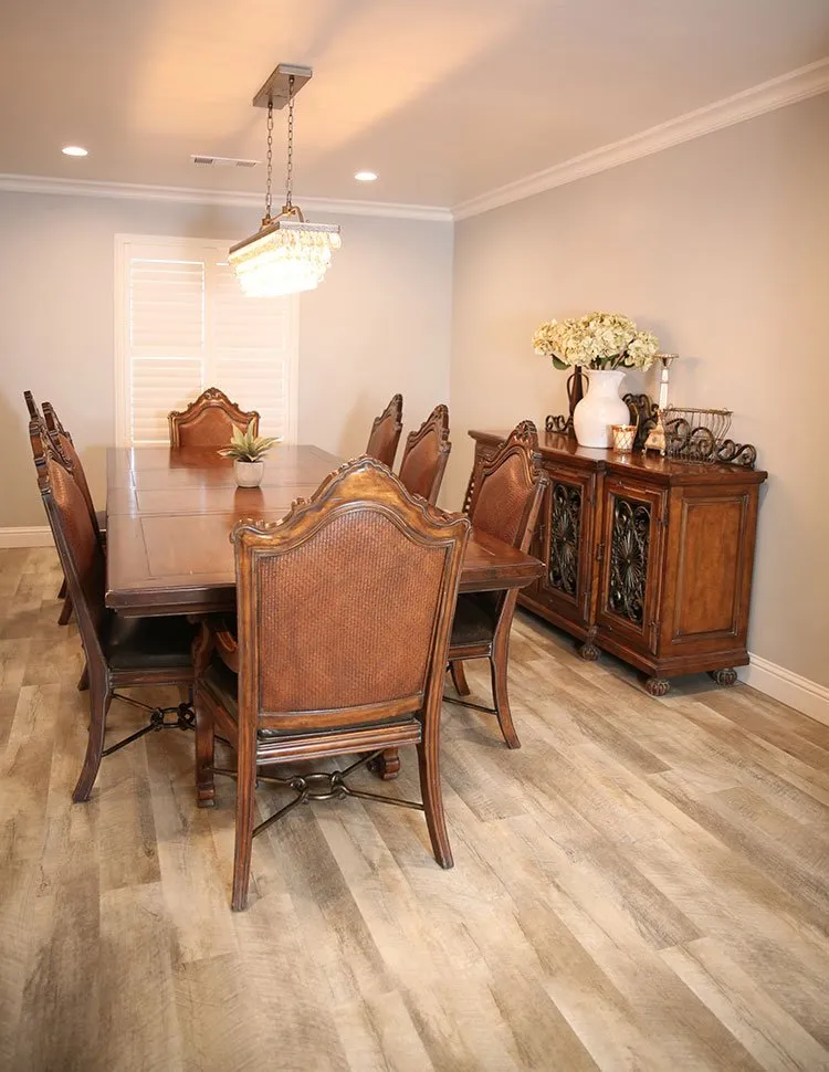 Dining room set on beach colored wood-look flooring