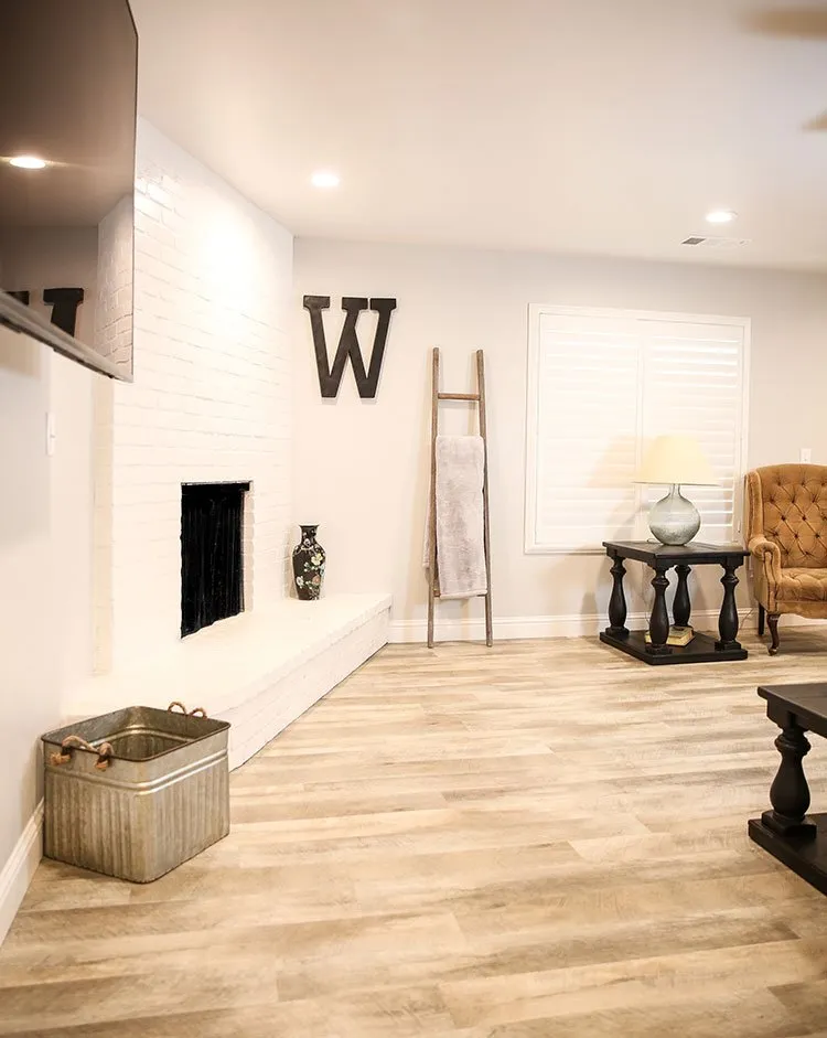 Living room with fireplace on LVP flooring, Hanford, CA