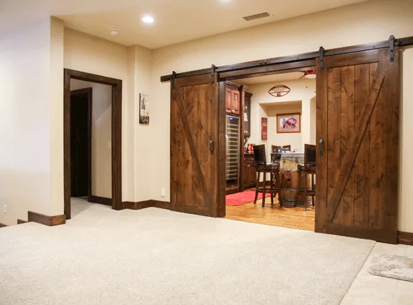 Entry way to sports room with Karastan carpet