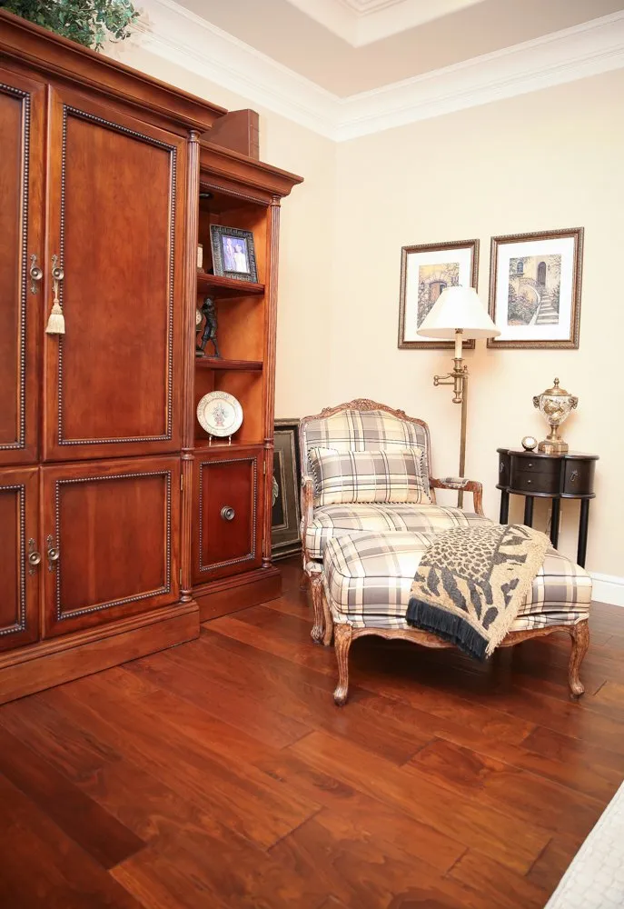 Chair in corner sitting area on hardwood plank flooring