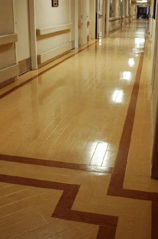 Hanford CA hospital flooring with perimeter striping in hallway