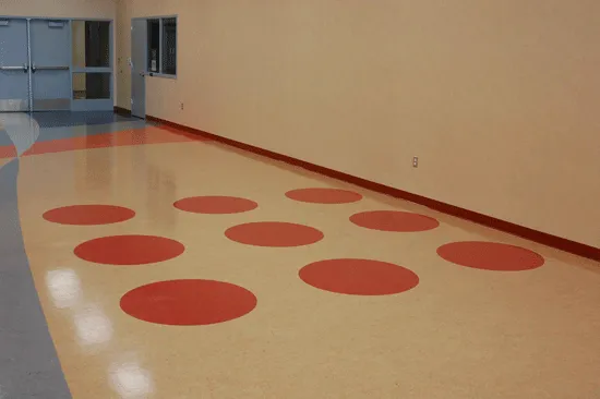 Big red  dots on commercial flooring, Porterville, California