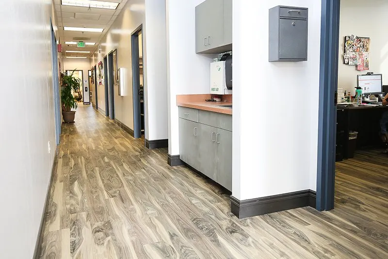 Hallway with wood-look vinyl flooring, Lemoore CA, Coyote Corner