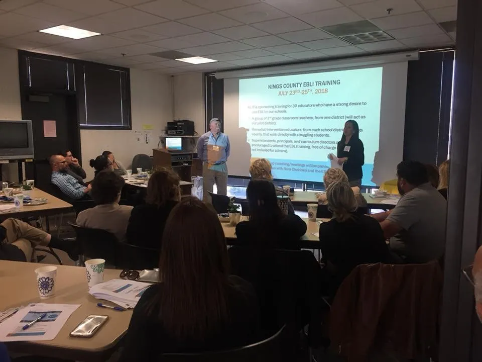 Presenters and teachers in literacy training session